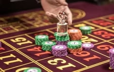 bitcasino casino presented on mobile device in Pakistan with slots and live games